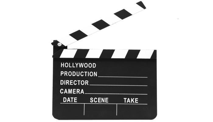 Image of an empty clapperboard on a white background - YouTube video marketing tips and tricks - Image
